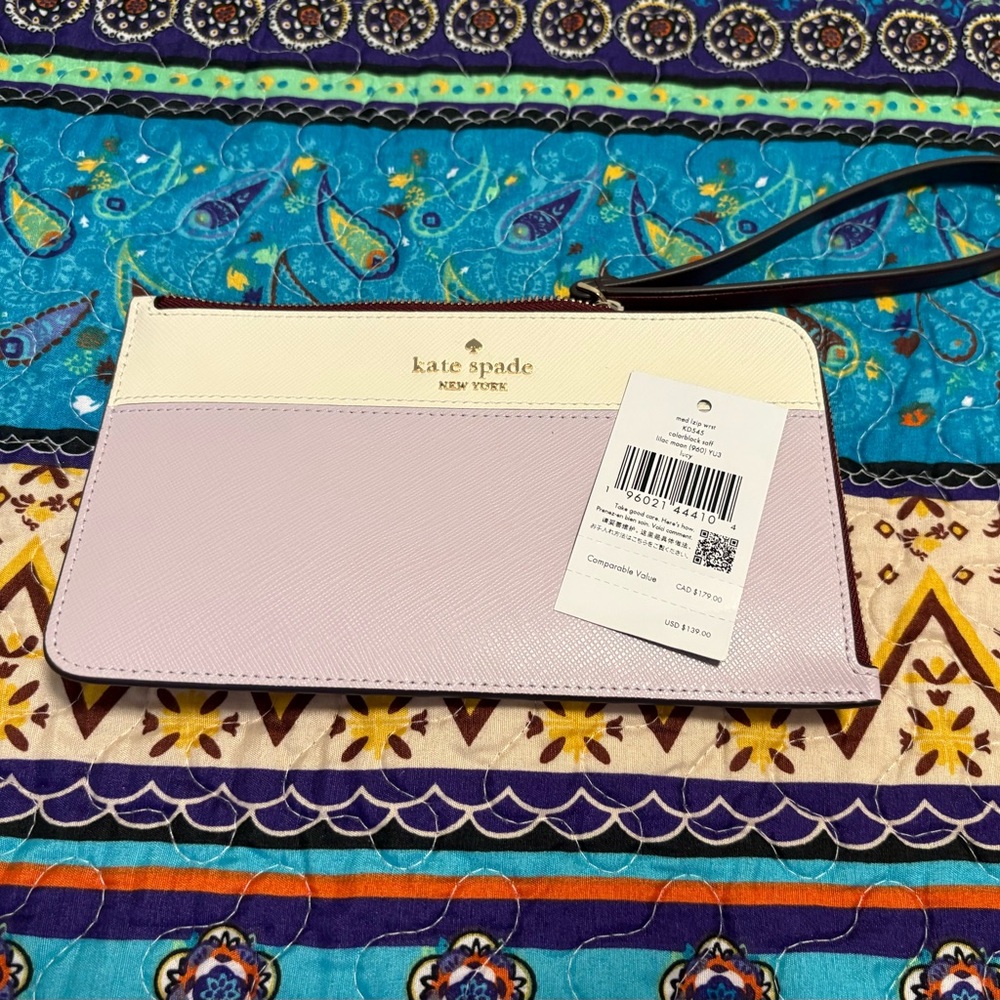 kate spade medium Cream and Lavender zip Wristlet